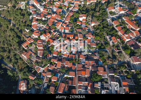 Bird's-eye view capturing the charm of a small Cypriot village of Lofou with traditional architecture. Limassol District, Cyprus Stock Photo