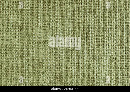 Jacquard woven coarse weave texture upholstery khaki fabric. Textile background, furniture textile material, wallpaper, backdrop. Cloth structure clos Stock Photo