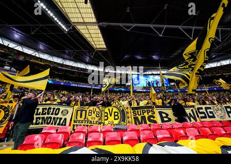 London, UK. 01st June, 2024. Borussia Dortmund fans with flags on the stands during the UEFA Champions League Final match between Borussia Dortmund and Real Madrid played at Wembley Stadium on June 1, 2024 in London, England. (Photo by Bagu Blanco/PRESSINPHOTO) Credit: PRESSINPHOTO SPORTS AGENCY/Alamy Live News Stock Photo