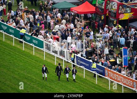 Aidan O'Brien, Ryan Moore, Wayne Lordan and Declan McDonagh check the course ahead of the Betfred Derby on derby day of The Betfred Derby Festival at Epsom Downs Racecourse. Picture date: Saturday June 1, 2024. Stock Photo