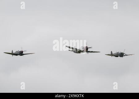 Duxford, UK. 01st June, 2024. Republic P-47D Thunderbolt is joined by Supermarine Spitfire Mk IXb MH434 and Supermarine Spitfire IX PV202, during the Duxford Summer Air Show: D-Day 80 at IWM Duxford, Duxford, United Kingdom, 1st June 2024 (Photo by Cody Froggatt/News Images) in Duxford, United Kingdom on 6/1/2024. (Photo by Cody Froggatt/News Images/Sipa USA) Credit: Sipa USA/Alamy Live News Stock Photo