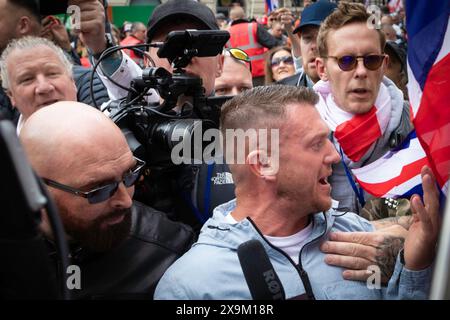 London, UK. 01st June, 2024. ÊTommy Robinson leads the march ahead of his new documentary LAWFARE. The public screening highlights a two-tier policing system that Tommy claims is happening nationally. Credit: Andy Barton/Alamy Live News Stock Photo