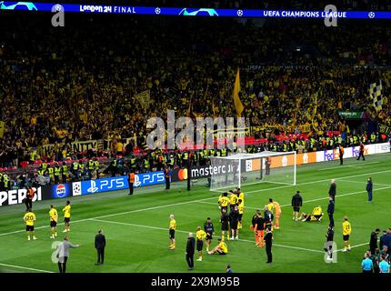 Borussia Dortmund players appear dejected at the end of the UEFA Champions League final at Wembley Stadium in London. Picture date: Saturday June 1, 2024. Stock Photo