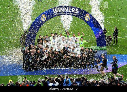 Real Madrid players and staff celebrate after winning the UEFA ...