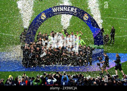 Real Madrid players and staff celebrate after winning the UEFA ...