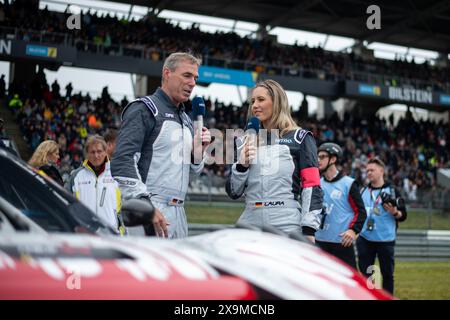 Laura Papendick (RTL Nitro TV Moderatorin), Dirk Adorf (RTL TV Experte, Rennfahrer) in der Startaufstellung, GER, 52. ADAC Ravenol 24h Nuerburgring, 24 Stunden Rennen, 01.06.2024  Foto: Eibner-Pressefoto/Michael Memmler Stock Photo