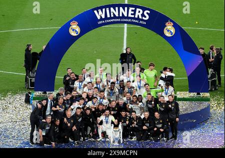 Real Madrid players and staff celebrate after winning the UEFA ...