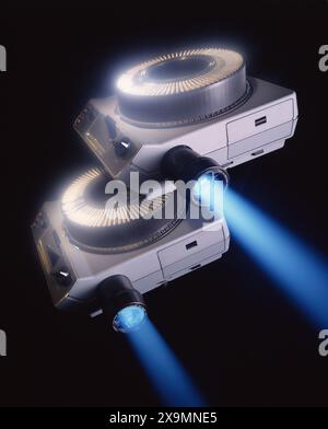 Two Kodak Carousel slide projectors.  Copy space. Light beam. Vacation, business slide show presentation. Stock Photo