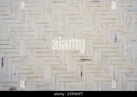 Background from a wall made of small beige clinker bricks Stock Photo