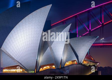 A night view featuring architectural detail of Sydney Opera House and Sydney Harbour Bridge in Sydney, New South Wales, Australia. Stock Photo