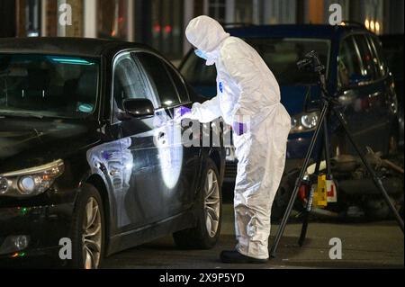 North Road, Selly Oak, Birmingham, June 2nd 2024 - West Midlands Police are appealing for information after a man was found with serious injuries on Bristol Road, Selly Oak last night (1 June). The 32-year-old was taken to hospital in a serious condition. A forensic officer was photographed recording the scene and removing a meat cleaver from a commercial bin. the CSI officer also took swabs of blood found on one vehicle and another substance from another. A white moped lay close to where the large knife was discovered and was removed by daylight. Credit: Stop Press Media/Alamy Live News Stock Photo