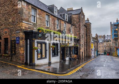 Edinburgh, Scotland, UK - May 8, 2023 - Greyfriars Bobby Bar, historic pub at 34 Candlemaker Row, famous for a legend of a dog known as Bobby. Stock Photo