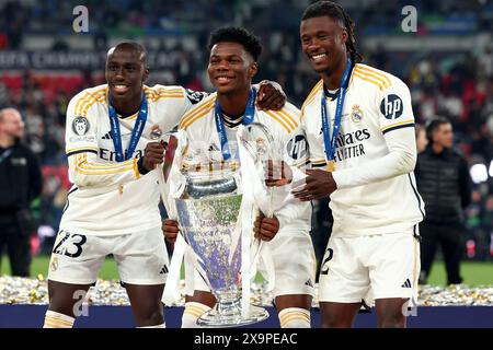 1st June 2024; Wembley Stadium, London, England; UEFA Champions League Football Final, Borussia Dortmund versus Real Madrid; Ferland Mendy, Aurelien Tchouameni and Eduardo Camavinga of Real Madrid celebrate with the UEFA Champions League Trophy Stock Photo