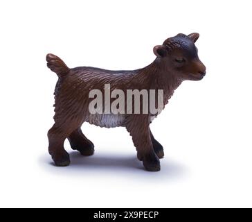 Toy Plastic Goat Side View Cut Out on White. Stock Photo
