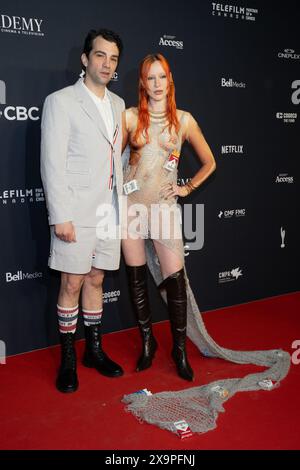 (L to R) Jay Baruchel and Rebecca-Jo Dunham attend the 2024 Canadian