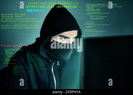 Cybercrime, hacker and computer virus with typing for code, futuristic and cyber attack with overlay. Male criminal, hoodie and ready for trojan horse Stock Photo