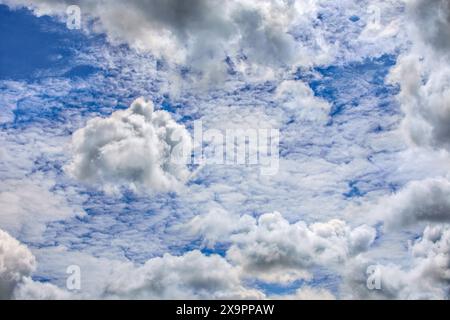 Mixture of high Cirrus and low-level Cumulus clouds - central France. Stock Photo