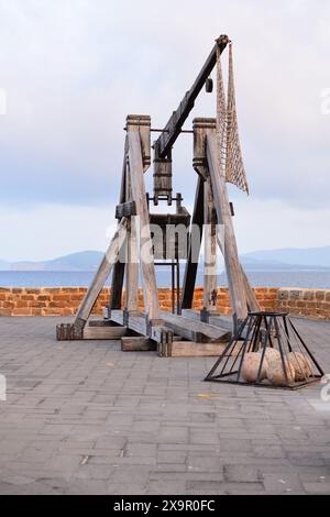 Trebuchet on the ramparts around the historical city of Alghero, Sardinia island, Italy. Stock Photo