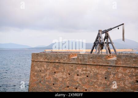 Trebuchet on the ramparts around the historical city of Alghero, Sardinia island, Italy. Stock Photo