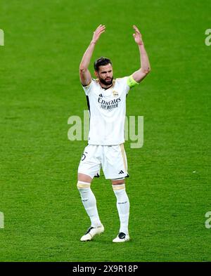 Real Madrid's Nacho Fernandez celebrates after team-mate Daniel Carvajal scores their side's first goal of the game during the UEFA Champions League final at Wembley Stadium in London. Picture date: Saturday June 1, 2024. Stock Photo