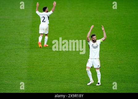 Real Madrid's Nacho Fernandez celebrates after team-mate Daniel Carvajal scores their side's first goal of the game during the UEFA Champions League final at Wembley Stadium in London. Picture date: Saturday June 1, 2024. Stock Photo