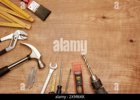 Assorted work tools on wood Stock Photo