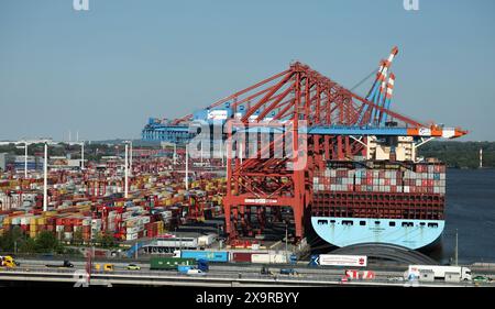 Hamburg, Germany. 13th May, 2024. Containers are handled at Eurogate's container terminal in the port of Hamburg. Credit: Christian Charisius/dpa/Alamy Live News Stock Photo