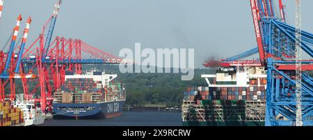 Hamburg, Germany. 13th May, 2024. Container ships are handled at the Burchardkai terminal (CTB, r) of Hamburger Hafen und Logistik AG (HHLA) and the Eurogate container terminal (l). Credit: Christian Charisius/dpa/Alamy Live News Stock Photo