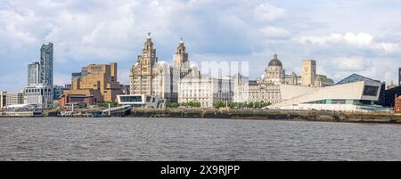 Panoramic cityscape of Liverppol's iconic waterffront  seen from the River Mersey - in Liverpool, Merseyside, UK on 21 May 2024 Stock Photo