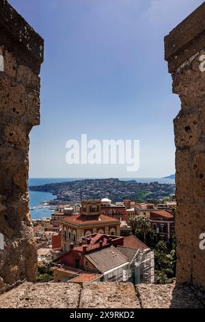 the panorama of Posillipo in Naples seen from the loophole of Castel Sant'Elmo Stock Photo