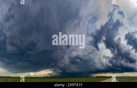 A large storm cloud with a raindrop Stock Photo
