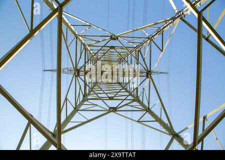 detail of electricity pylon under clear blue sky as energy symbol Stock ...