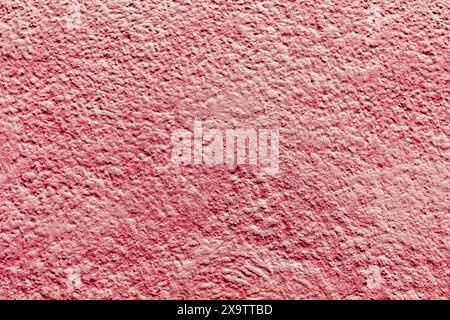 pattern  of structured mineral plaster wall painted in red Stock Photo