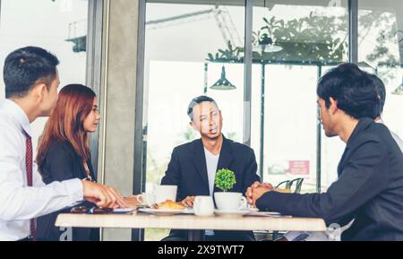 Business partner team meeting working together on office desk. Group of people diversity multiethnic teamwork collaboration communication. Business pe Stock Photo