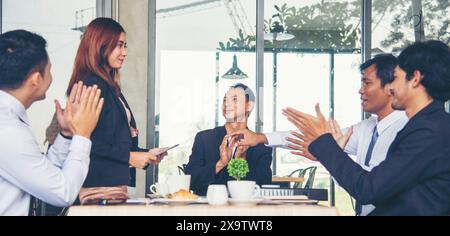 Business partner team meeting working together on office desk. Group of people diversity multiethnic teamwork collaboration communication. Business pe Stock Photo