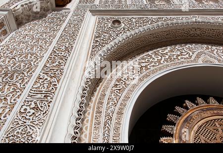 Ornate stucco work, the grandeur of Moroccan craftsmanship in Marrakech. Morocco, Africa. Stock Photo