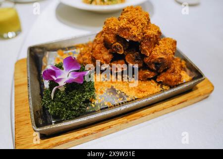 Chinese cuisine. Deep-fried pork Spare ribs with garlic. Stock Photo