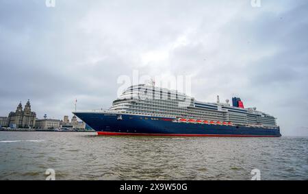 Cunard's Queen Anne sailing into the Mersey ahead of a naming ceremony at Liverpool Pier Head, as part of an introductory 'lap of honour' voyage around the British Isles. Picture date: Monday June 3, 2024. Stock Photo