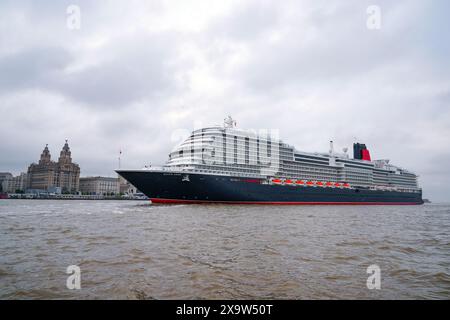 Cunard's Queen Anne sailing into the Mersey ahead of a naming ceremony at Liverpool Pier Head, as part of an introductory 'lap of honour' voyage around the British Isles. Picture date: Monday June 3, 2024. Stock Photo