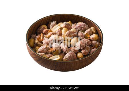 Roasted salted peanuts in wooden bowl on isolated white background Stock Photo