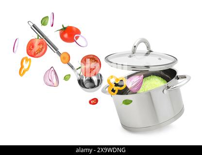 Fresh ingredients falling into saucepan on white background Stock Photo