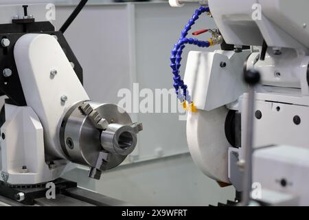 High precision cylindrical CNC grinding machine close up. Selective focus. Stock Photo