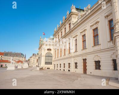 Wien, Austria - July 28, 2023: Belvedere Palace in summer sunny day. Baroque beautiful facade with statues and bas-reliefs of Lower Belvedere. Stock Photo