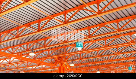 Industrial steel structure  modern orange metal roof Stock Photo