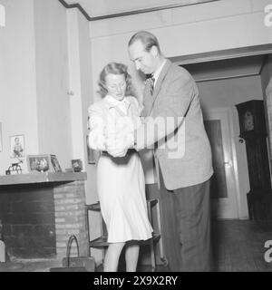 Current 12- 1945: Norway's youngest minister, milorg chief Hauge. Here at the home of Defense Minister Jens Chr. Hauge. After the children have been put to bed, Hauge and wife enjoy themselveshimself with a swing in his pleasant home in Professor Dahlsgate. Photo: Th. Skotaam / Aktuell / NTB ***Photo is not image processed*** Stock Photo