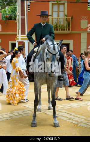 Rider in traditional dress at Jerez de la Frontera Horse Fair. Stock Photo