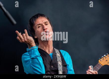 Singer songwriter and guitarist and former member of The Smiths Johnny Marr playing a live gig at The Piece Hall in Halifax. Stock Photo