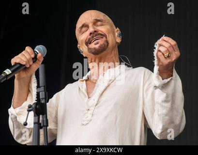 Tim Booth and his band James playing an orchestral and choral set live at the Latitude Festival in Henham Park in Suffolk. Stock Photo