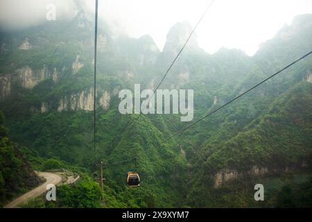 View landscape mountain and cable car cableway for chinese people foreign traveler travel visit Tianmen Shan cave or Heaven Gate in Tianmen Mountain N Stock Photo