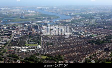 aerial view of the Middlesbrough town skyline from the west looking up the River Tees towards the North Sea Stock Photo